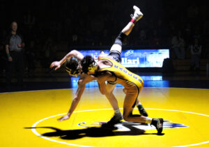 photo of a high school wrestling match.