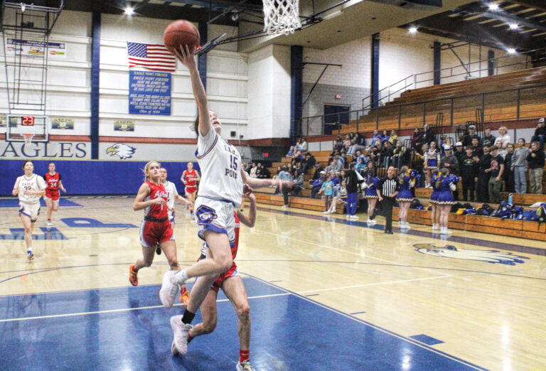 photo of a girls high school basketball game.