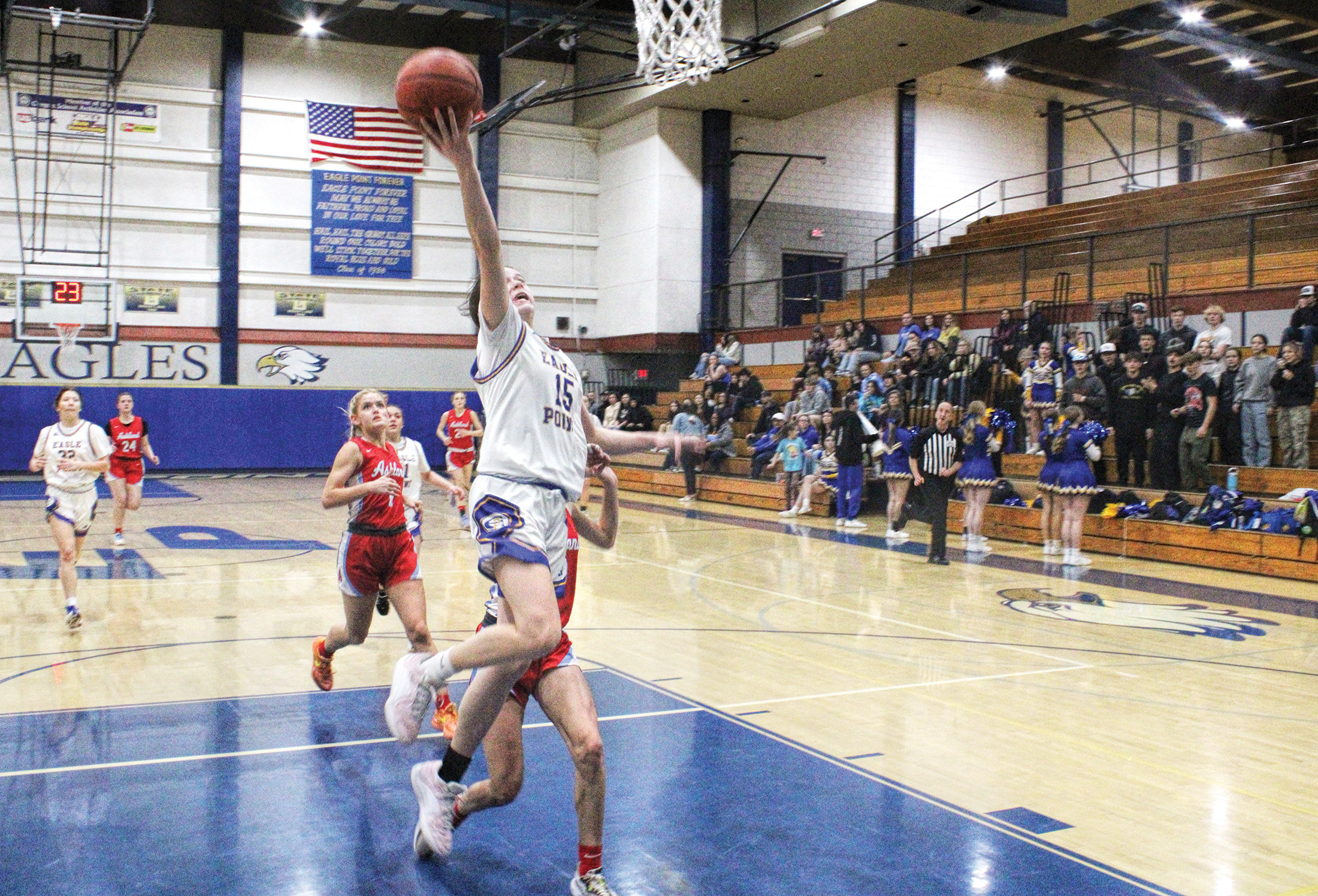 photo of a girls high school basketball game.
