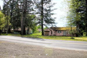 photo of two boarded up hoses.