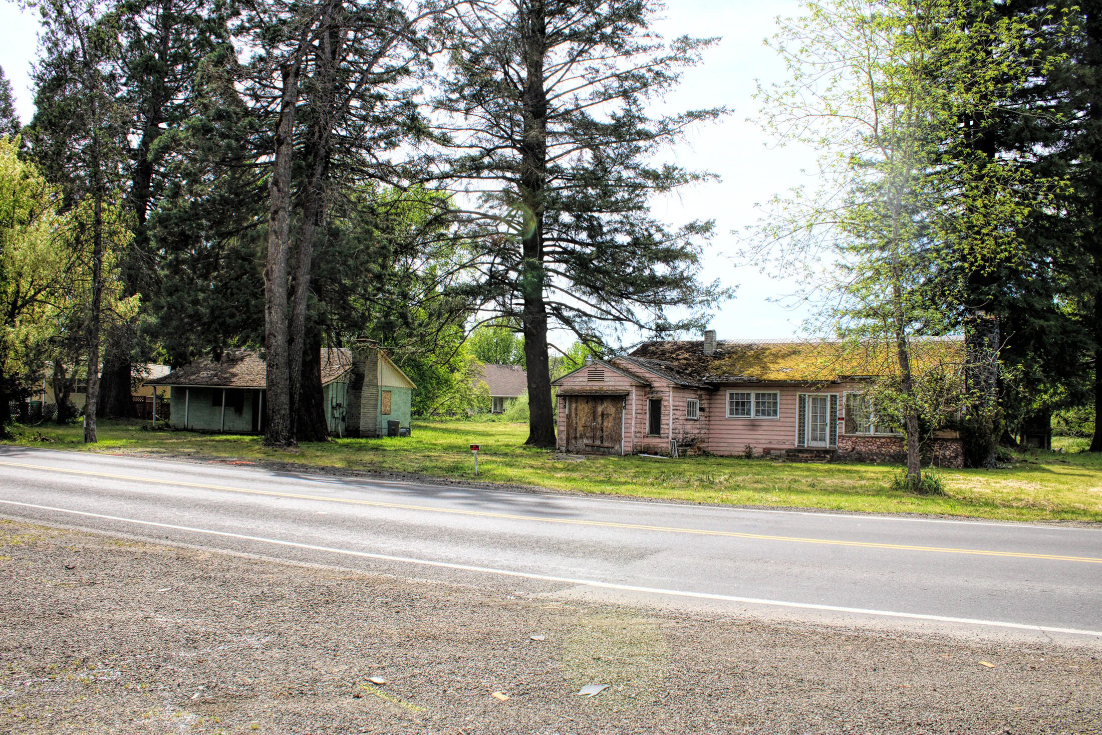 photo of two boarded up hoses.