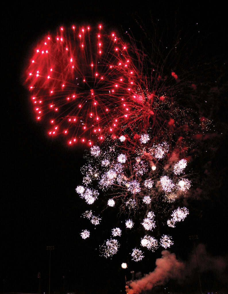 photo of red and white fireworks.