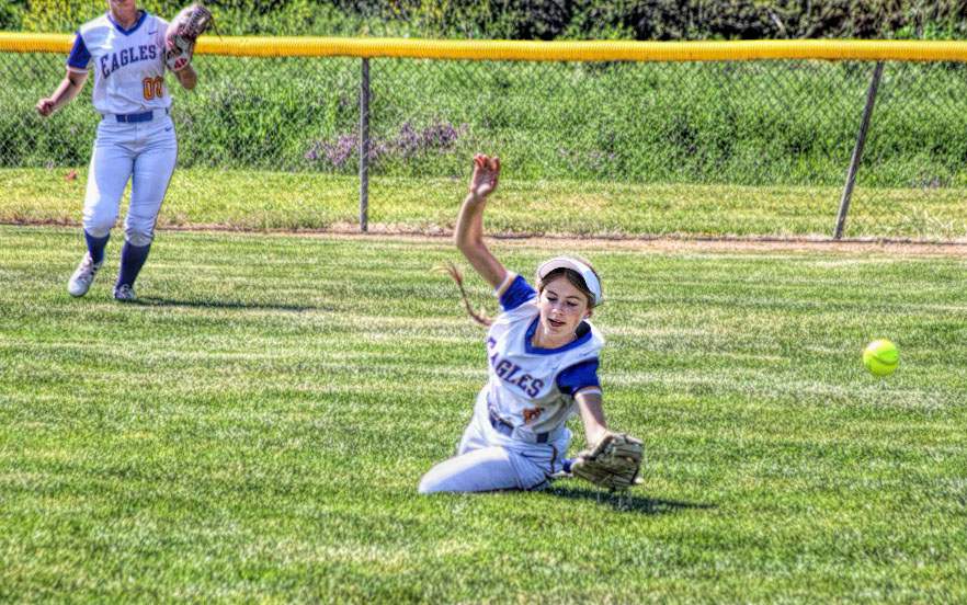 Photo of a high school softball game.