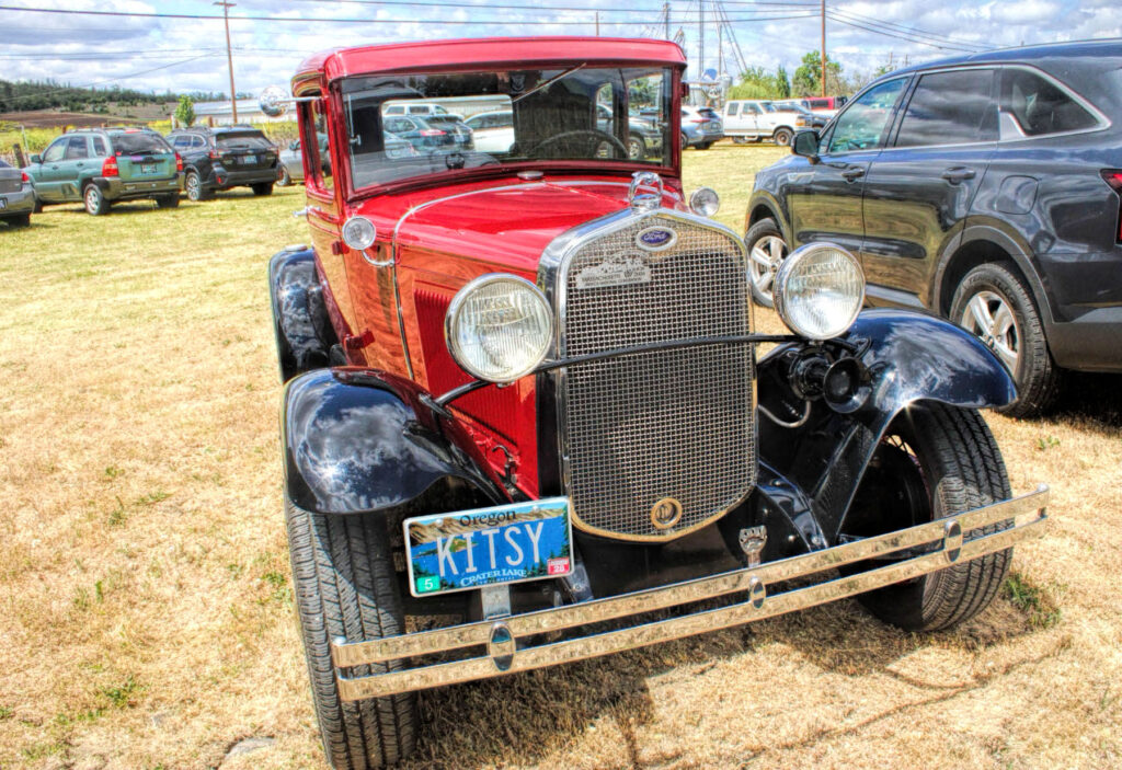 photo of a cherry red ford model T.