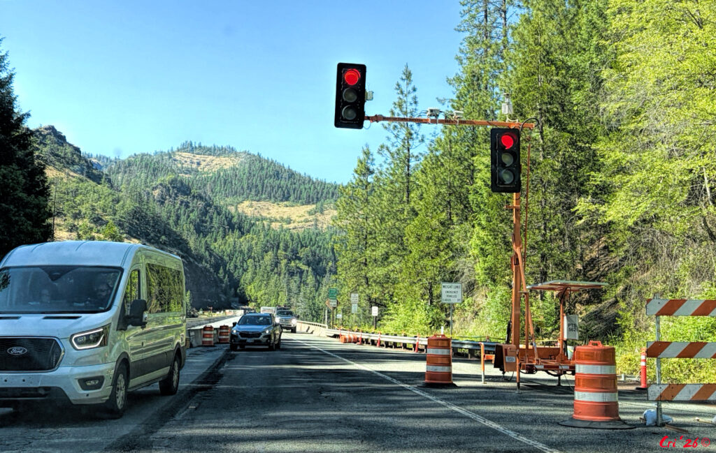 photo of the hwy 62 bridge over lost creek lake with one lane closed for construction and a stop light installed.