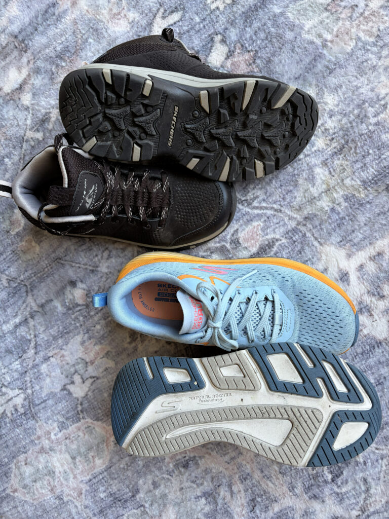 photo of a pair of lightweight "sneaker" hiking boots alongside a pair of sneakers.
