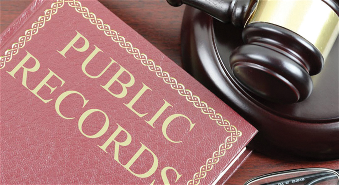 photo of a gavel and hard cover book reading "Public Records"
