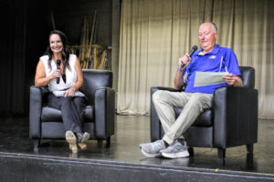 photo of a female athlete being interviewed.