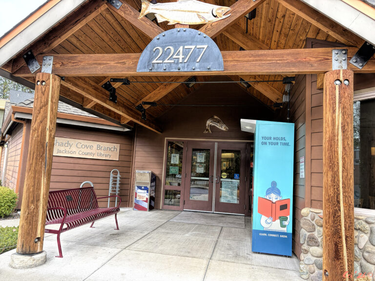 photo of the shady cove library with the new ballot box by the doors.