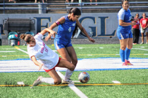 photo of a high school girls soccer game.