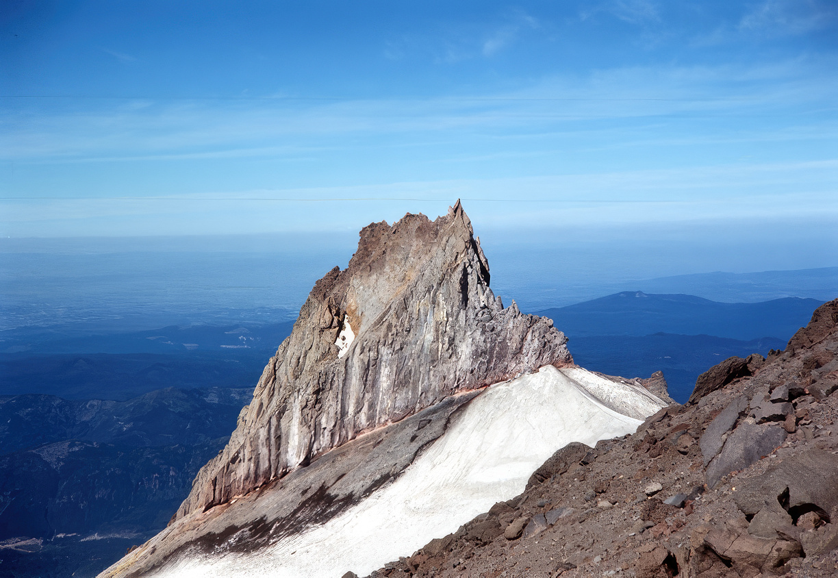 photo of a sharp, rocky peak near the top of mount hood.
